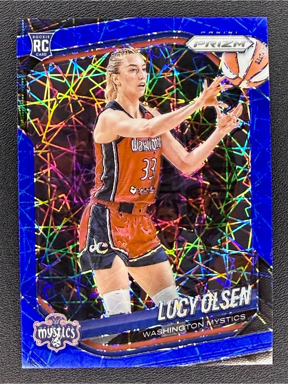 2025 Panini Prizm WNBA Lucy Olsen 104 Rookie RC Blue Laser Velocity Holo Mystics